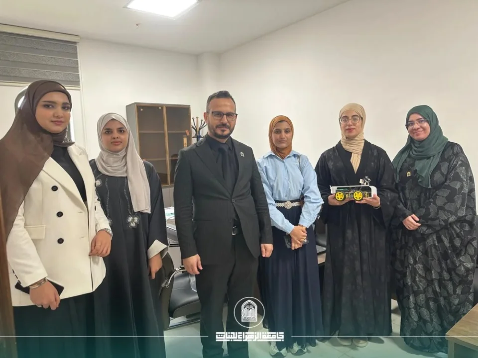 Female students and faculty members from the College of Engineering participate in evaluating projects qualifying for the NURAI 2026 Robotics and Artificial Intelligence Championship.