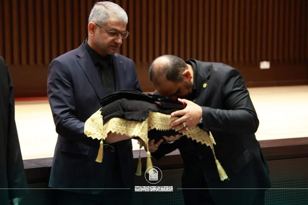 Al-Zahraa University for Women Organizes Ashura Flag Raising Ceremony